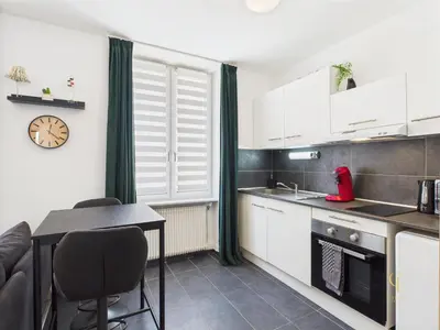 Cuisine ou kitchenette dans l'établissement Cocon Zen Balneo - Appartement RDC proche centre Mulhouse