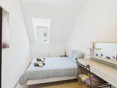 Un ou plusieurs lits dans un hébergement de l'établissement Cocon Jaune - Duplex 2e étage prox centre Mulhouse