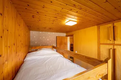 Un ou plusieurs lits dans un hébergement de l'établissement Chalet Paradis, panoramic view, garden & terrace
