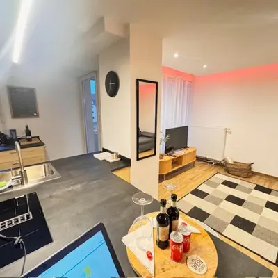 Télévision ou salle de divertissement dans l'établissement SkylineStudio