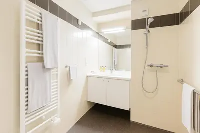 Salle de bains dans l'établissement Zenao Appart'hôtels Wintzenheim