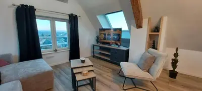 Coin salon dans l'établissement Spacieux, cosy et tout équipé pour un confort optimal