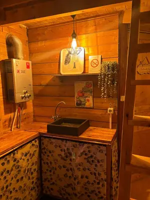 Cuisine ou kitchenette dans l'établissement Cabane domaine du morbues