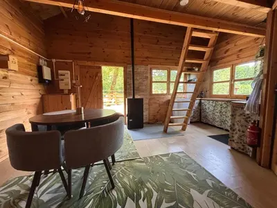 Coin salon dans l'établissement Cabane domaine du morbues