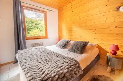 Un ou plusieurs lits dans un hébergement de l'établissement Chalet Ô Gustav, vue montagne, au calme, 8p