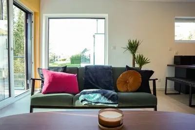 Coin salon dans l'établissement Superbe maison au calme avec stationnement gratuit