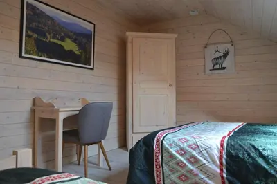 Un ou plusieurs lits dans un hébergement de l'établissement Chalet des Aigrettes, Les 1000 Etangs