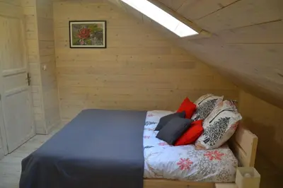 Un ou plusieurs lits dans un hébergement de l'établissement Chalet des Aigrettes, Les 1000 Etangs