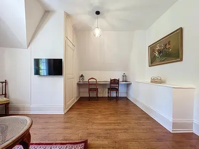 Télévision ou salle de divertissement dans l'établissement Le Duplex Sahler - Château XXᵉsiècle