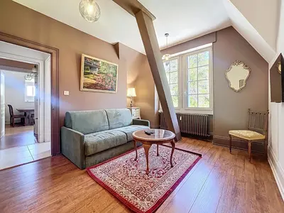 Coin salon dans l'établissement Le Duplex Sahler - Château XXᵉsiècle