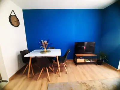 Coin salon dans l'établissement L'Échappée douce - Central, paisible et lumineux