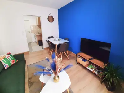 Télévision ou salle de divertissement dans l'établissement L'Échappée douce - Central, paisible et lumineux