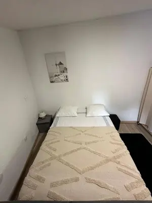 Un ou plusieurs lits dans un hébergement de l'établissement Three Borders Apartment