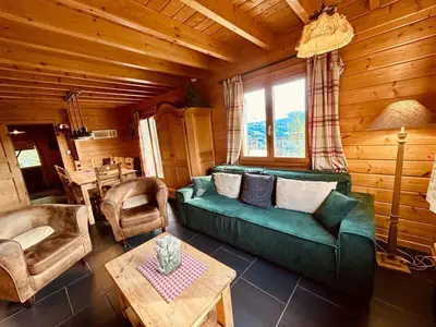 Coin salon dans l'établissement Chalet Le Meix-SaGe
