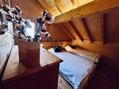 Un ou plusieurs lits dans un hébergement de l'établissement Chalet Le Meix-SaGe