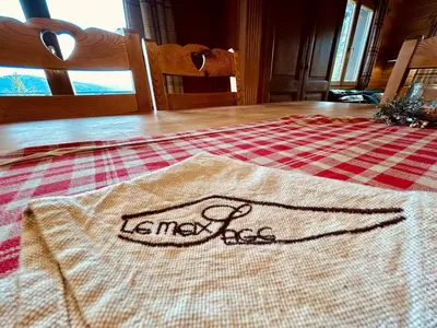 Un ou plusieurs lits dans un hébergement de l'établissement Chalet Le Meix-SaGe