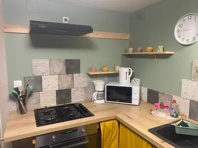 Cuisine ou kitchenette dans l'établissement L'atelier des couleurs