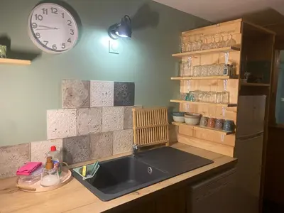 Cuisine ou kitchenette dans l'établissement L'atelier des couleurs