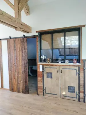 Cuisine ou kitchenette dans l'établissement Appartement neuf Le Grenier d'Oscar