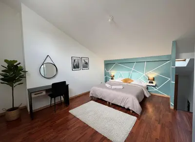 Un ou plusieurs lits dans un hébergement de l'établissement Duplex cosy- proche centre ville