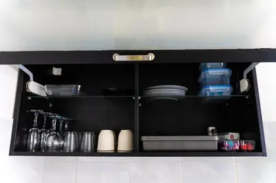 Cuisine ou kitchenette dans l'établissement Duplex cosy- proche centre ville