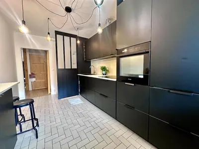 Cuisine ou kitchenette dans l'établissement #LaMaisonVerte-calme en zone piétonne de Mulhouse