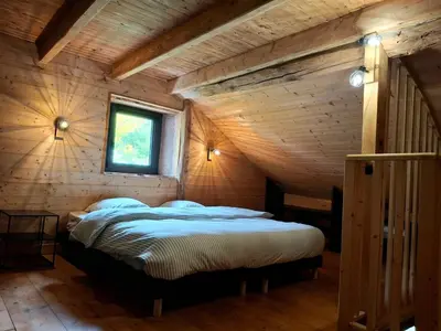 Un ou plusieurs lits dans un hébergement de l'établissement La Ferme Alter Native