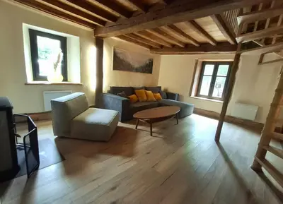 Coin salon dans l'établissement La Ferme Alter Native