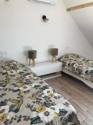 Un ou plusieurs lits dans un hébergement de l'établissement Gîte des Hirondelles 4 à 5 personnes proche Europapark