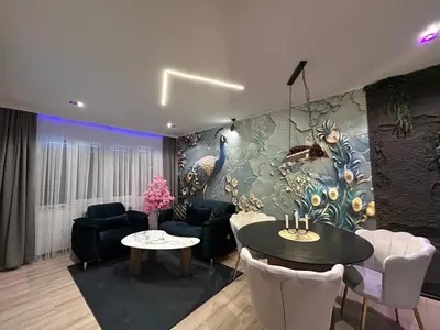 Coin salon dans l'établissement Le Prestige Spa jacuzzi et sauna traditionnel