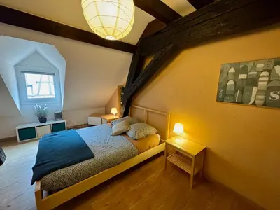 Un ou plusieurs lits dans un hébergement de l'établissement GITE Au petit Bredela EGUISHEIM