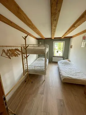 Un ou plusieurs lits dans un hébergement de l'établissement Gites des Mines d'Argent- Le Saint-Louis 5 personnes avec terrasse privative-Le Saint-Barthélemy 4 personnes