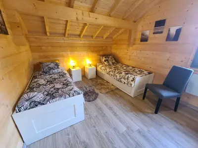 Un ou plusieurs lits dans un hébergement de l'établissement Chalet des 4 Vents: Nature et Activités Vosges - FR-1-589-815
