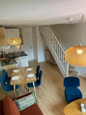 Coin salon dans l'établissement Le Petit Carrousel