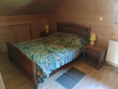 Un ou plusieurs lits dans un hébergement de l'établissement chalet Leon