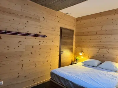 Un ou plusieurs lits dans un hébergement de l'établissement Appartement à La Bresse - cadre naturel et calme