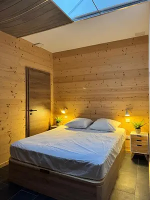 Un ou plusieurs lits dans un hébergement de l'établissement Appartement à La Bresse - cadre naturel et calme