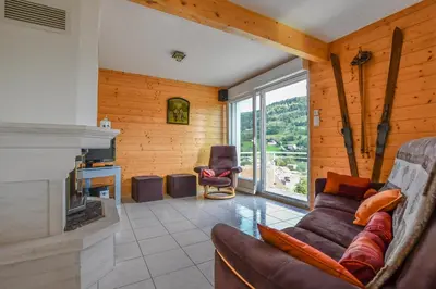 Coin salon dans l'établissement Chalet de la Lunelle
