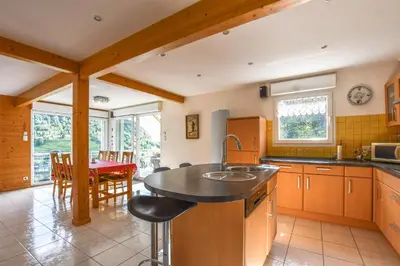 Cuisine ou kitchenette dans l'établissement Chalet de la Lunelle