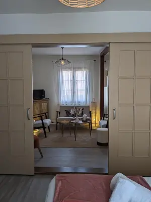 Un ou plusieurs lits dans un hébergement de l'établissement La Maison des Potiers avec Terrasse et Parking