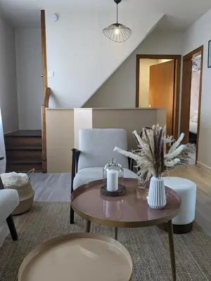 Coin salon dans l'établissement La Maison des Potiers avec Terrasse et Parking