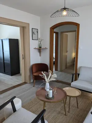 Coin salon dans l'établissement La Maison des Potiers avec Terrasse et Parking