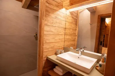 Salle de bains dans l'établissement Le Chalet Vosges Alsace - La Petite Ferme 4 étoiles