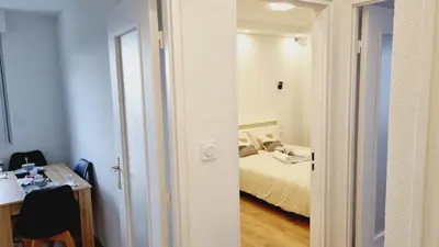 Un ou plusieurs lits dans un hébergement de l'établissement Appartement moderne Treeland - Basel - Airport