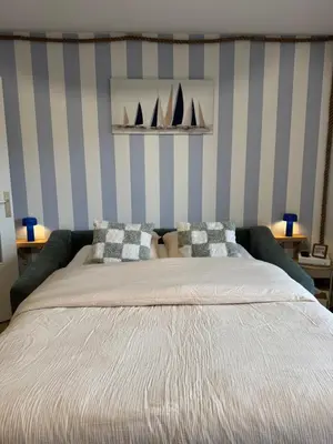 Un ou plusieurs lits dans un hébergement de l'établissement Le Bleu Marine, grand studio au calme, à 2 pas du lac !
