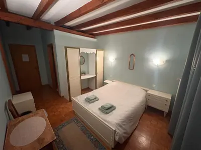 Un ou plusieurs lits dans un hébergement de l'établissement Chambres d'hôtes Monicala