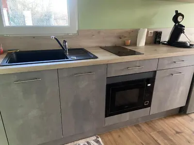Cuisine ou kitchenette dans l'établissement Chez Mymy
