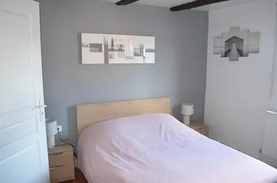 Un ou plusieurs lits dans un hébergement de l'établissement Appartement 6 personnes dans maison alsacienne