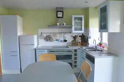 Cuisine ou kitchenette dans l'établissement Gite de la combe