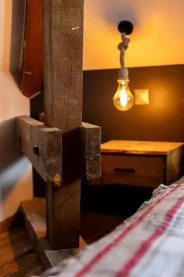 Un ou plusieurs lits dans un hébergement de l'établissement Villa - Détente & Jacuzzi aux portes de Gérardmer